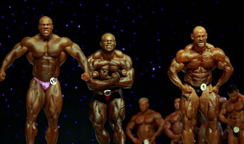 Кай Грин, Kai Greene на турнире Мистер Олимпия 2009 вместе с Фил Хит, Бренч Уоррен