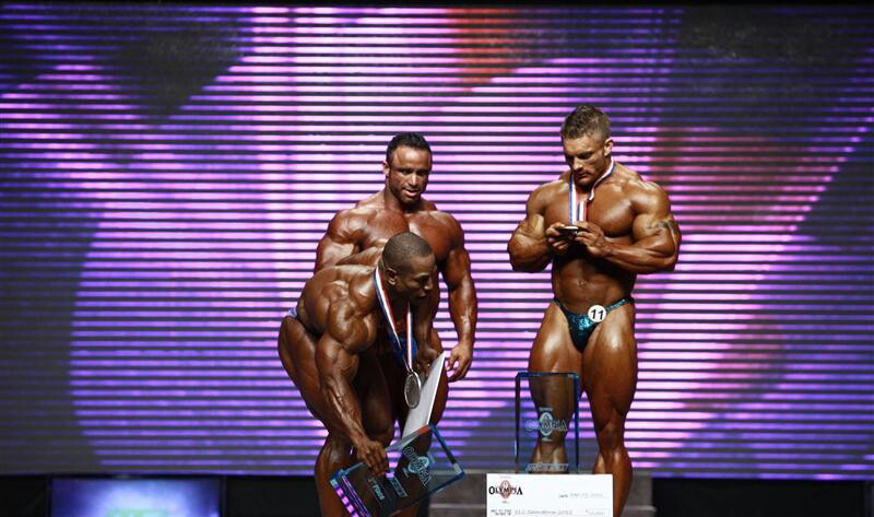 Джеймс Флекс Льюис, James Flex Lewis на турнире Мистер Олимпия 2012 вместе с Дэвид Хенри, Хосе Реймонд